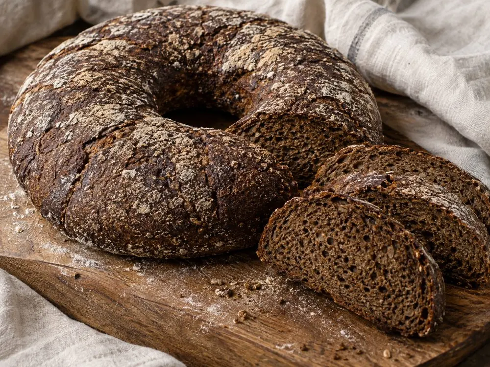 Dark Finnish sourdough rye bread cut into slices